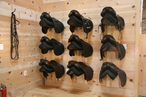 Saddles resting gently protected by Save Your Saddle Racks